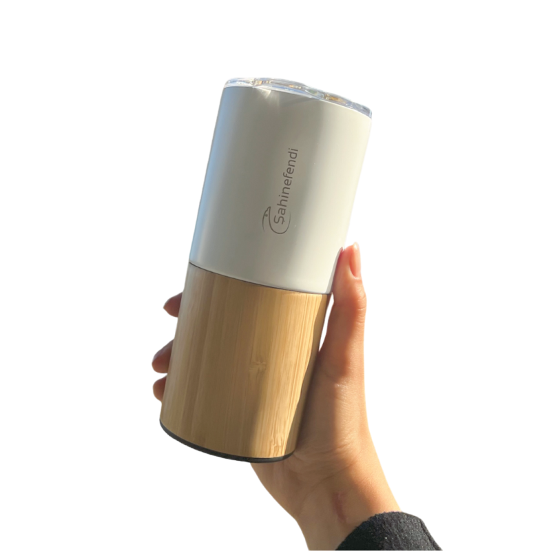 مطارة حافظة للحرارة مزينة بخشب البامبو image 1