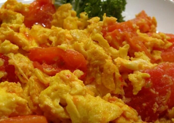 Eggs w/ Tomatoes image 0