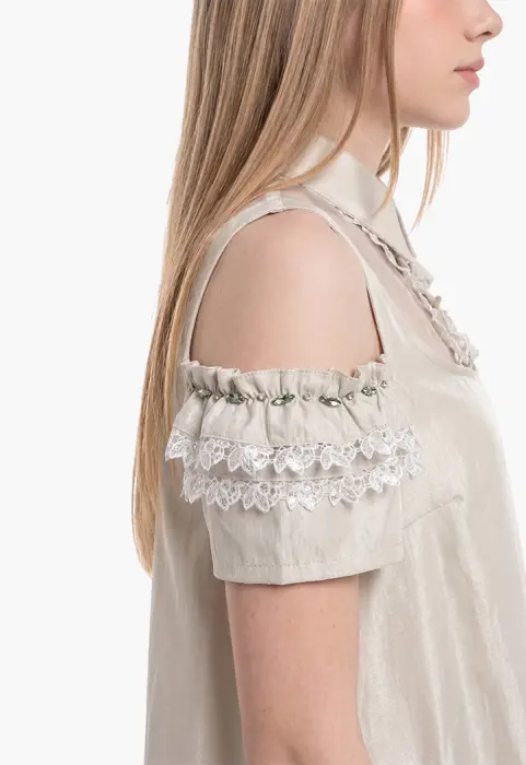 A flowing dress with off-the-shoulder sleeves and lace details. image 5