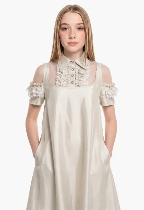 A flowing dress with off-the-shoulder sleeves and lace details. image 3
