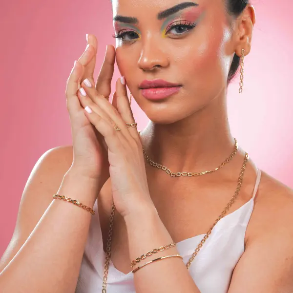 خاتم ذهبي شكل X image 6